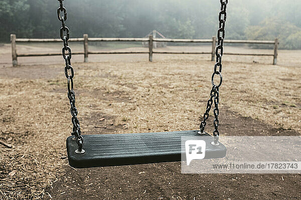 Chain swing in empty park