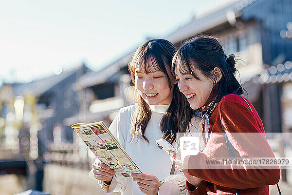 Young Japanese women enjoying a trip together