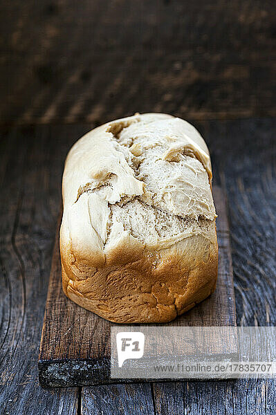 White homemade bread on a wooden background