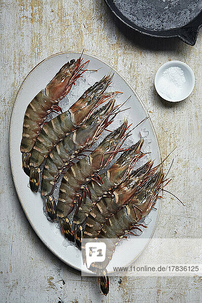 Raw king prawns on a plate