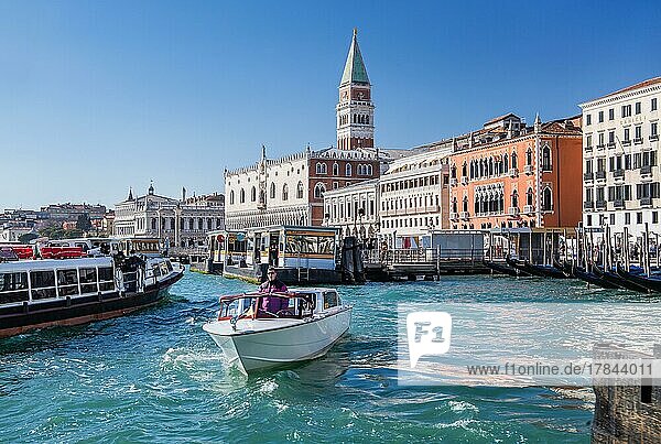 Water taxi in front of the waterfront with Doge's Palace  Campanile and Hotel Danieli  Venice  Veneto  Adriatic Sea  Northern Italy  Italy  Europe