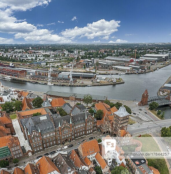 Drone shot  drone photo  panorama photo  historical city centre of Lübeck with view of the castle with the castle gate  European Hanseatic Museum  the river Trave and the harbour  lift bridge  Lübeck  Schleswig-Holstein  Germany  Europe