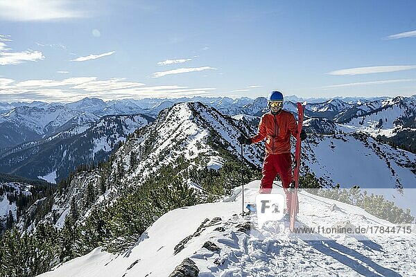 Ski tourers at the summit of the Jagerkamp  winter  Bavaria  Germany  Europe