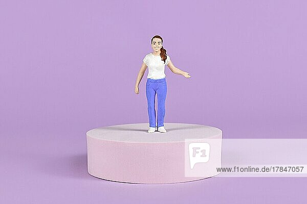 Woman figure with shirt and jeans on pedestal in front of violet background