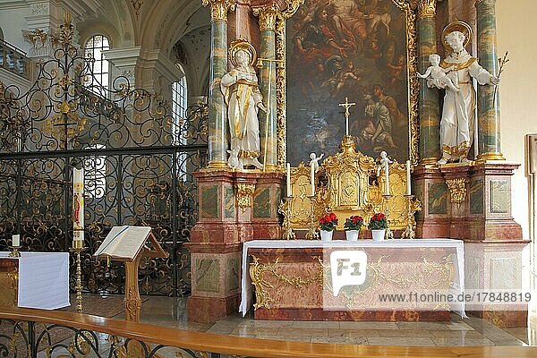 Ornate altar with painting  figures and candlesticks in the baroque monastery of St. Peter  Upper Black Forest  Southern Black Forest  Black Forest  Baden-Württemberg  Germany  Europe