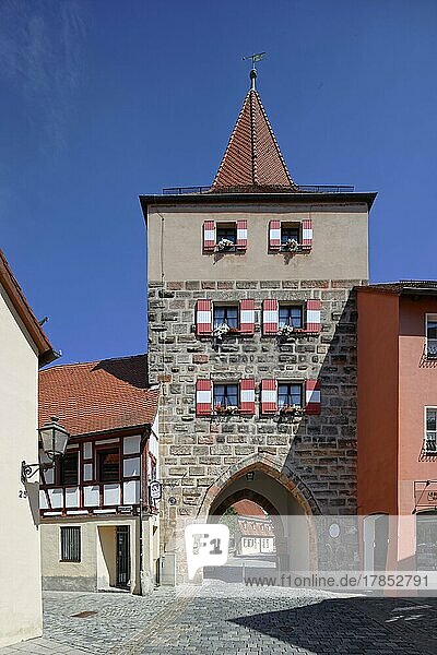 Hersbrucker Tor  square  four-storey sandstone ashlar building with pointed helmet  14th-15th century  inscribed 1476  tower  street with cobblestones  village centre Lauf an der Pegnitz. Nürnberger Land  Middle Franconia  Bavaria  Germany  Europe