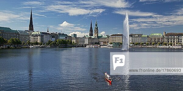 Inner Alster Lake with Alsterfontaine and city skyline  Hamburg  Germany  Europe