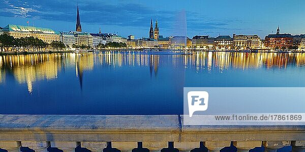 Inner Alster with Alsterfontaine and city skyline in the evening  Hamburg  Germany  Europe