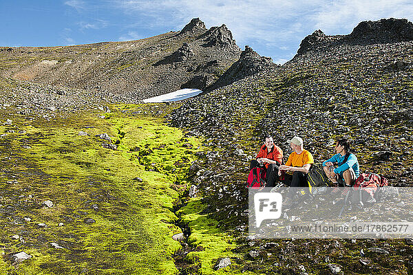 taking a break while hiking in the eastern fjords of Iceland
