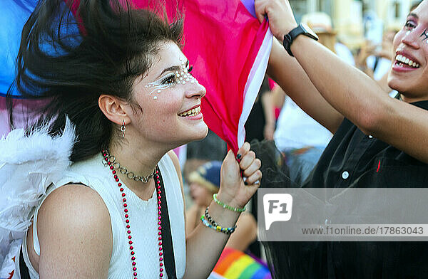 A trans couple enjoying the Gay Pride parade 2022 Madrid