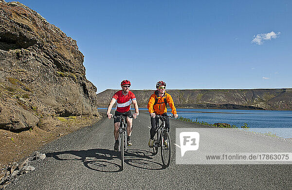 bikers cycling around Kleifarvatn on the Reykjanes Peninsula