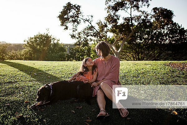 Mother & Daughter Posing at Sunset in Park with Dog in San Diego