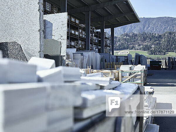 Natural stone slabs stacked at industry