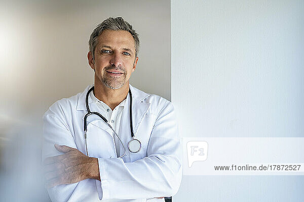 Portrait of confident doctor with arms crossed