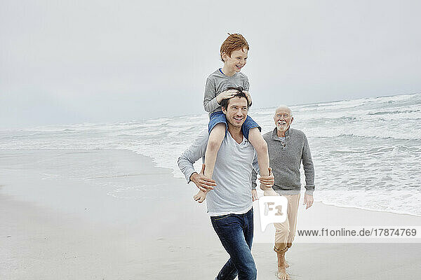 South Africa,  Eastcoast,  Muizenberg,  family,  beach,  grandfather,  father,  grandchild,  generations