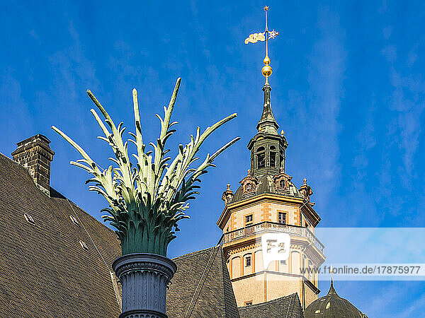 Germany  Saxony  Leipzig  Nikolaisaule column with tower of Saint Nicholas Church in background