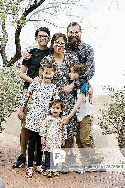 Portrait of family with children (2-3  8-9  14-15)