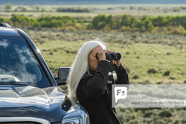 United States  Idaho  Bellevue  Senior woman using binoculars