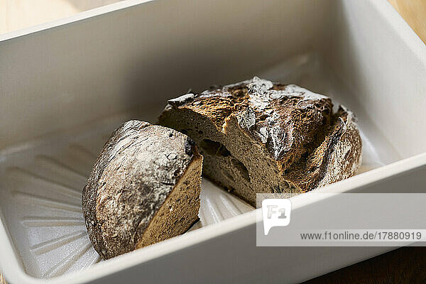 Rustic bread pieces in dish