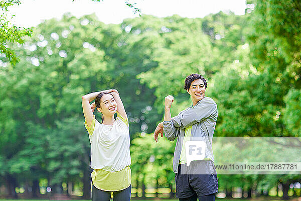 Japanese couple training at city park