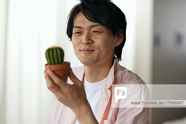 Japanese man gardening at home