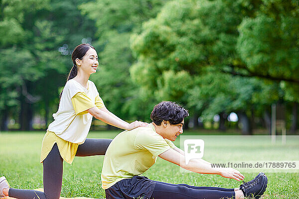 Japanese couple training at city park