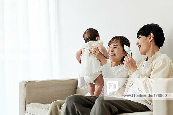 Japanese newborn with mother and father
