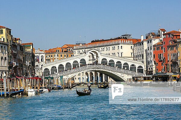 Rialto Bridge Rialto Bridge over Canal Grand with Gondola Vacation Travel City in Venice  Italy  Europe