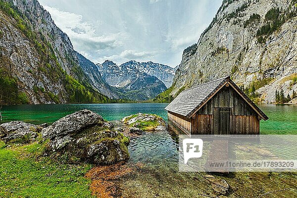 Boat dock hangar on Obersee mountain lake in Alps. Bavaria  Germany  Europe