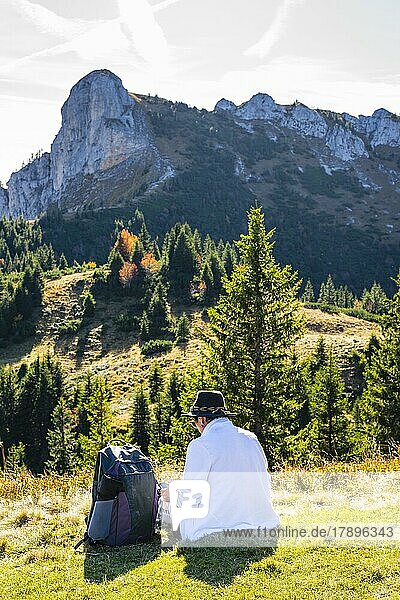 Mountain hiker taking a break  woman 50+  Ammergau Alps  Allgäu  Bavaria  Germany  Europe