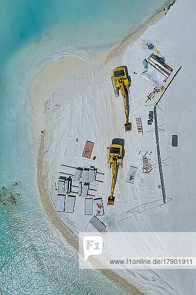 Maldives  Aerial view of construction site at edge of sandy beach