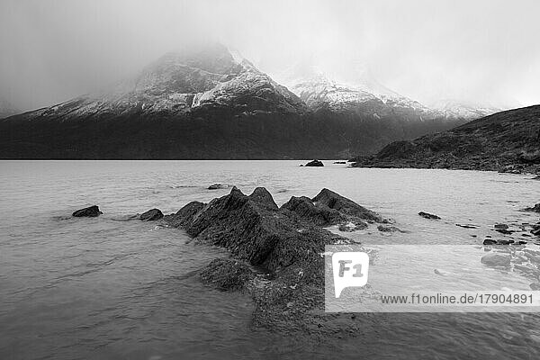 Los Cuernos peaks hiding in fog  Torres del Paine National Park  Patagonia  Chile  South America