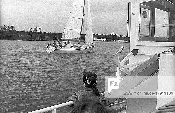 GDR  Berlin  14. 04. 1990  excursion boat on the Müggelsee  sailing boat
