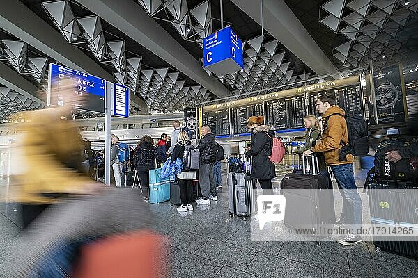 Frankfurt Airport  Fraport  Passengers waiting at check-in counters  Departure Hall C  Terminal 1  Frankfurt am Main  Hesse  Germany  Europe