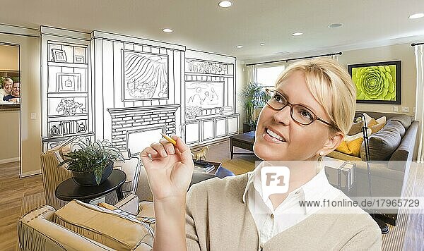 Creative woman with pencil over custom living room and design drawing