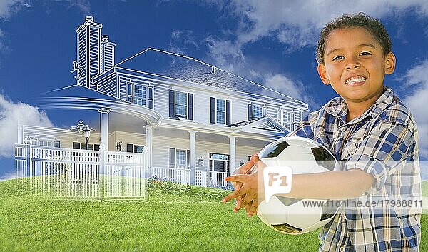 Gemischtrassiger Junge  der einen Fußball hält  mit geisterhafter Hauszeichnung  Teilfoto und sanften grünen Hügeln im Hintergrund