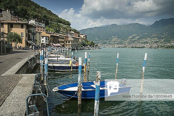 Boat moorings in the town on the lake island  Peschiera Maraglio  Monte Isola  Lago d'Iseo  Val Camonica  Central Alps  Brescia  Lombardy  Italy  Europe