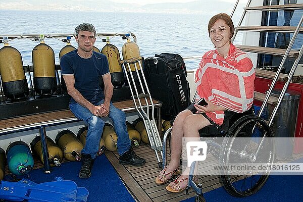 Disabled divers on board diving ship  wheelchair users  disabled diving