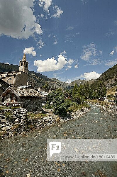 Mountain stream and village  Lanslebourg-Mont-Cenis  Savoie  Rhône-Alpes  Alps  France  Summer  Europe