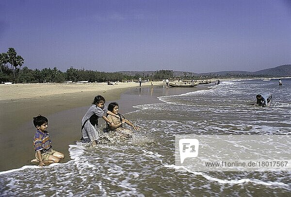 Children playing in Rishikonda beach in Visakhapatnam  Andhra Pradesh  India  Asia