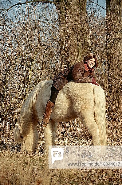 Girl with Icelandic pony bareback  Icelandic  reverse  white horse