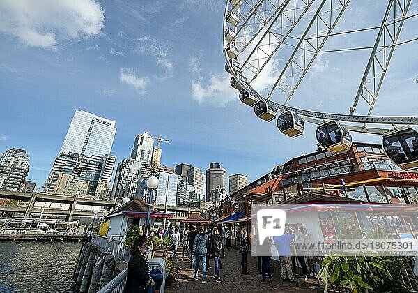 Waterfront with The Seattle Great Wheel  skyscrapers behind  Pier 57  Seattle  Washington  USA  North America