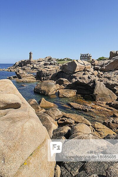 The lighthouse Pors Kamor at the Côte de granit rose  pink granite coast near Ploumanac'h  Brittany  France  Europe