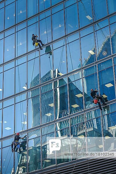 Window cleaner  high-rise building  Financial District  London  England  United Kingdom  Europe