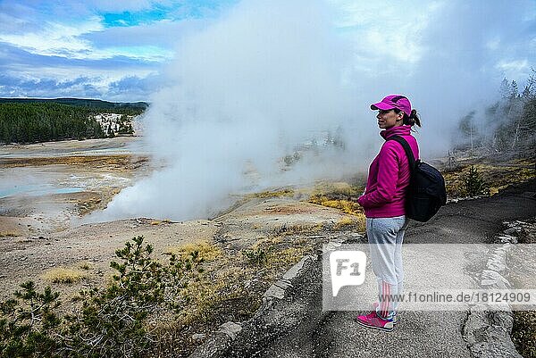 Young woman in Norris Geyser Basin  Yellowstone National Park  USA  North America