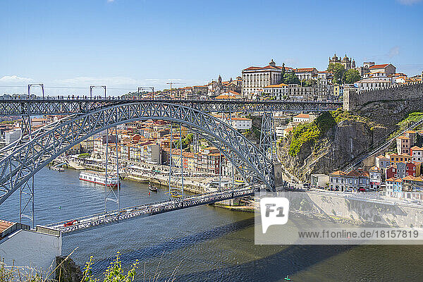 View of the Dom Luis I bridge over Douro River and terracota rooftops  UNESCO World Heritage Site  Porto  Norte  Portugal  Europe