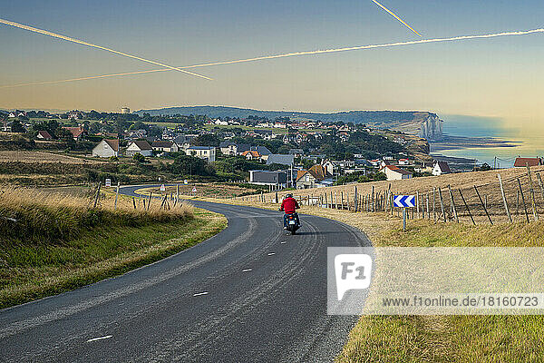 France  Normandy  Criel-sur-Mer  Motorcycle driving along country road
