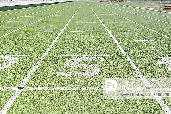 Running track with numbers on sports field