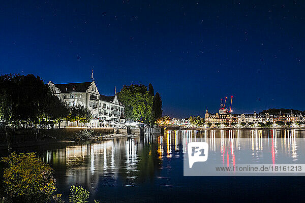 Germany  Baden-Wurttemberg  Konstanz  Shore of Lake Constance at night with city lights in background