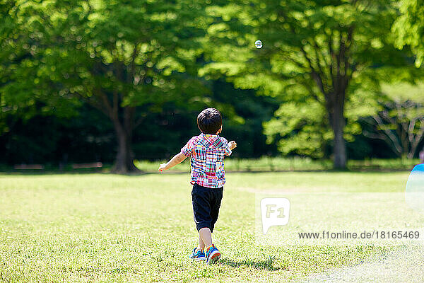 Japanese kid at a city park